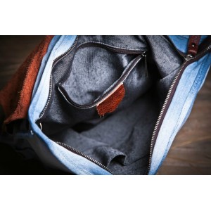 blue over the shoulder travel bag